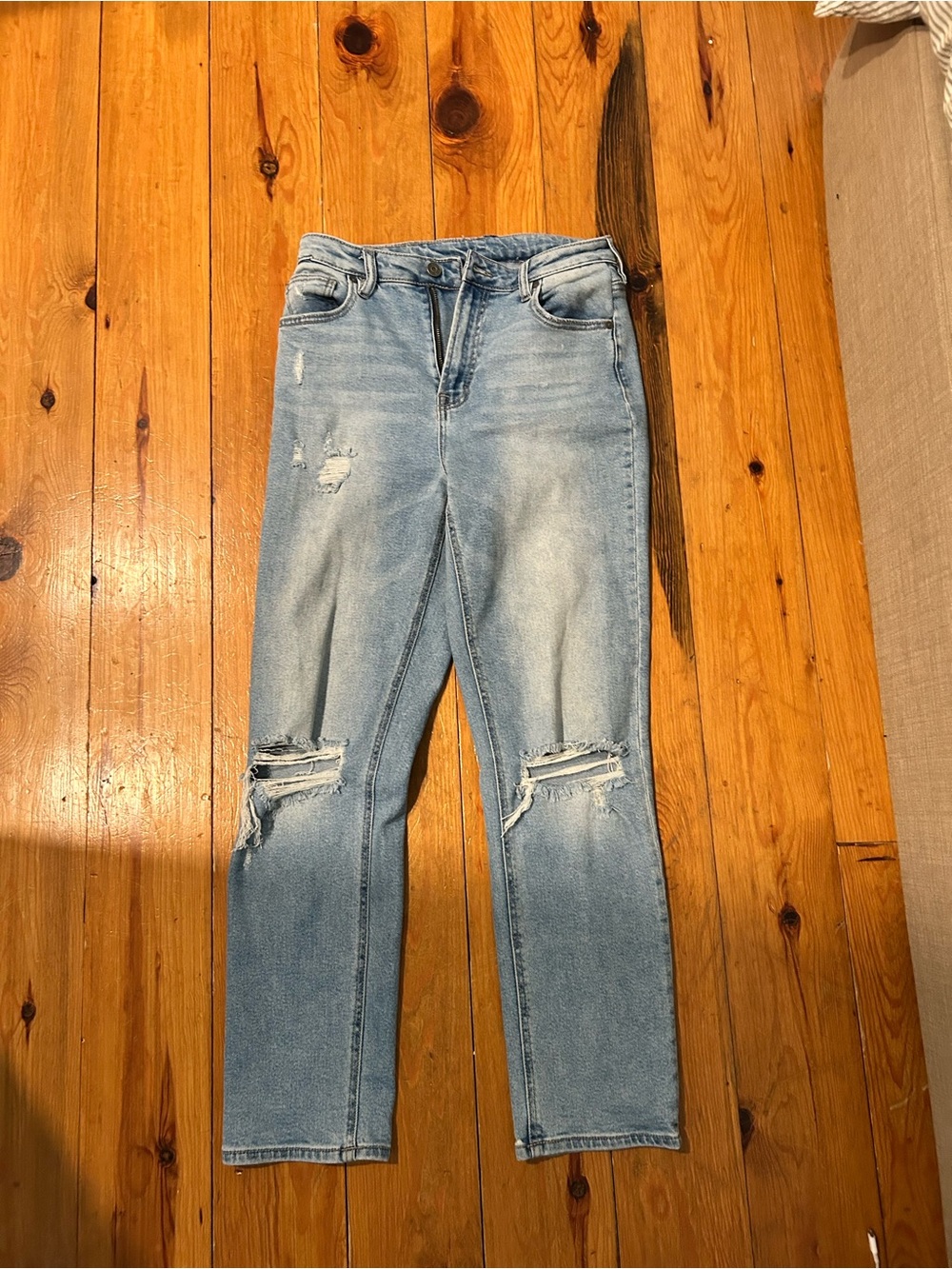 Women’s Straight Leg Light Blue Distressed Jeans